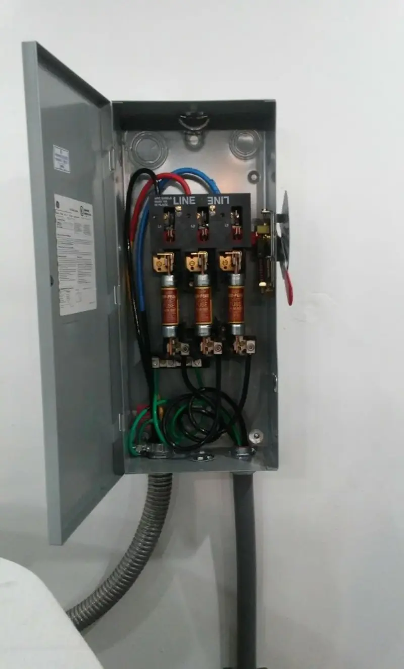 Three-phase disconnect switch installed for Smoke Detector Installation in Amityville